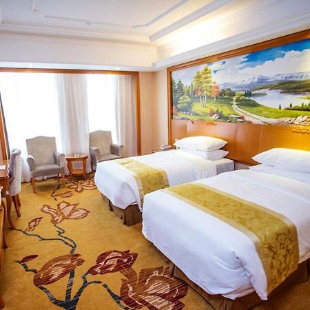 Vienna International Hotel Hangzhou Zhuantang Art School Wenyan Bagian luar foto