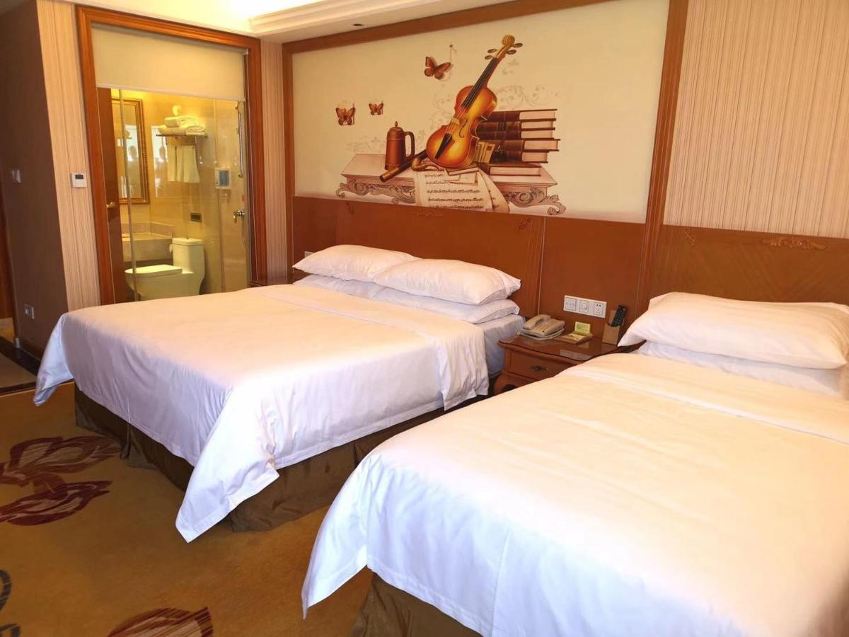 Vienna International Hotel Hangzhou Zhuantang Art School Wenyan Bagian luar foto