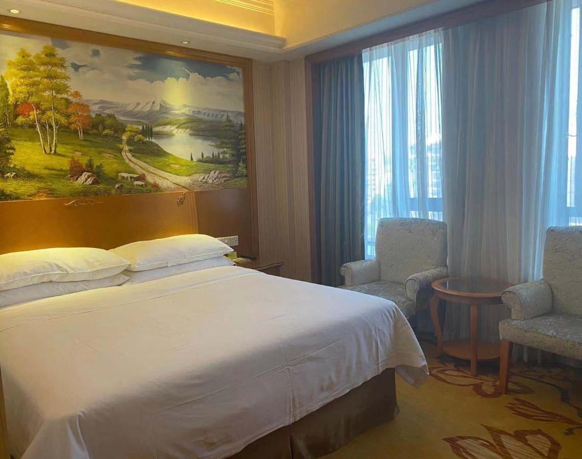 Vienna International Hotel Hangzhou Zhuantang Art School Wenyan Bagian luar foto